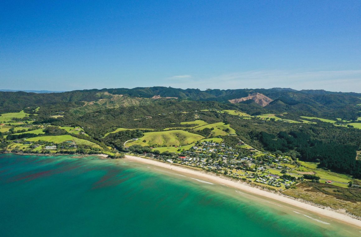 Drone view looking at The Highlands lifestyle subdivision from above Langs Beach/Waipu Cove